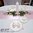 Tischgesteck weiß rosa Rosen mit Kerzenständer